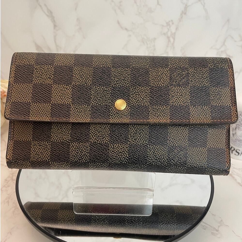Louis Vuitton Sarah Wallet in Damier Ebene Coated Canvas Fair Condition